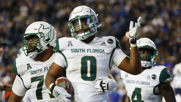 Sep 25, 2021; Provo, Utah, USA; South Florida Bulls running back Jaren Mangham (0) reacts to the Brigham Young Cougars fans after his touchdown in the fourth quarter against the Brigham Young Cougars at LaVell Edwards Stadium. Mandatory Credit: Jeffrey Swinger-USA TODAY Sports